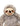 A close-up of a plush sloth toy with gray and beige fur, brown eye patches, and a black nose on a plain white background.